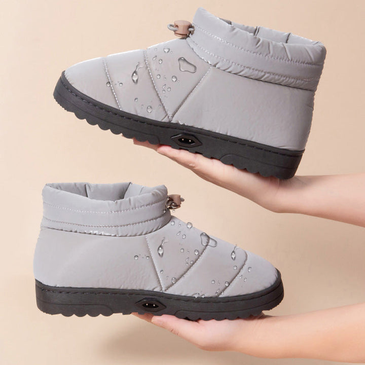 Elektrisch beheizte Plüschschuhe, unisex, bieten wohlige Wärme. Perfekt als Wintergeschenk und Fußwärmer.