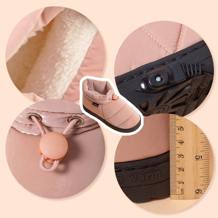 Weiche, elektrisch beheizte Plüschschuhe. Unisex Design in Grau & Rosa für gemütliche Wintertage zu Hause.