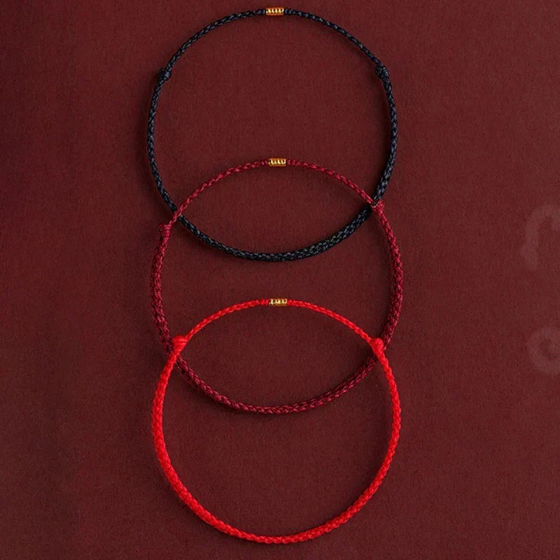 Spirituelles Unisex Armband: handgefertigt, rot-schwarz, von Mönch gesegnet für Achtsamkeit & Glück.