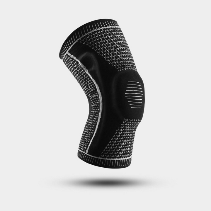 Athlet trägt atmungsaktive Unisex Kniebandage beim Sport. Bietet Komfort, Knieschutz & Stabilität beim Laufen.