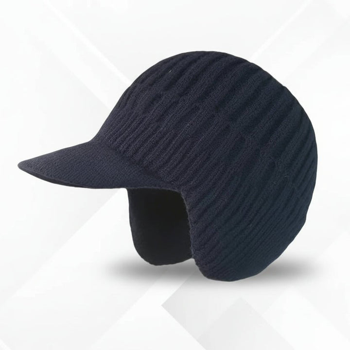 Wintermütze im Nordic-Stil, kombiniert mit passendem Schal und Handschuhen für den Winter.
