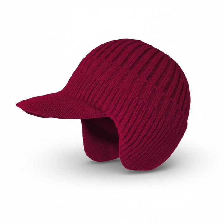 Nahaufnahme einer weichen Unisex-Wintermütze in Nordic-Optik, Detail des Strickmusters.