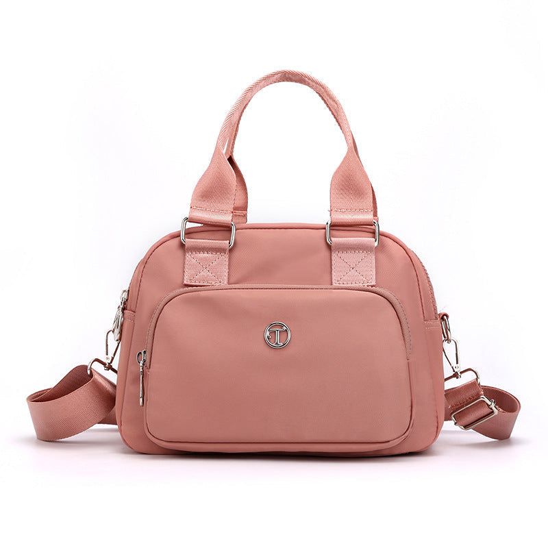 Trendige Tragetasche aus robustem Nylon, unisex, passend für jede Gelegenheit & Outfit.