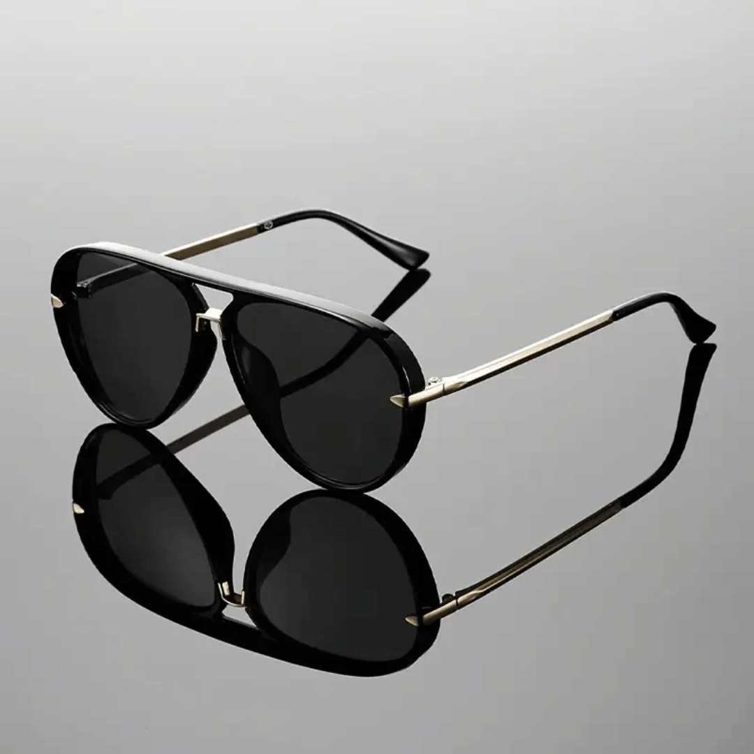 Klassische Unisex Piloten-Sonnenbrille mit dunklen Gläsern und effektivem Sonnenschutz.