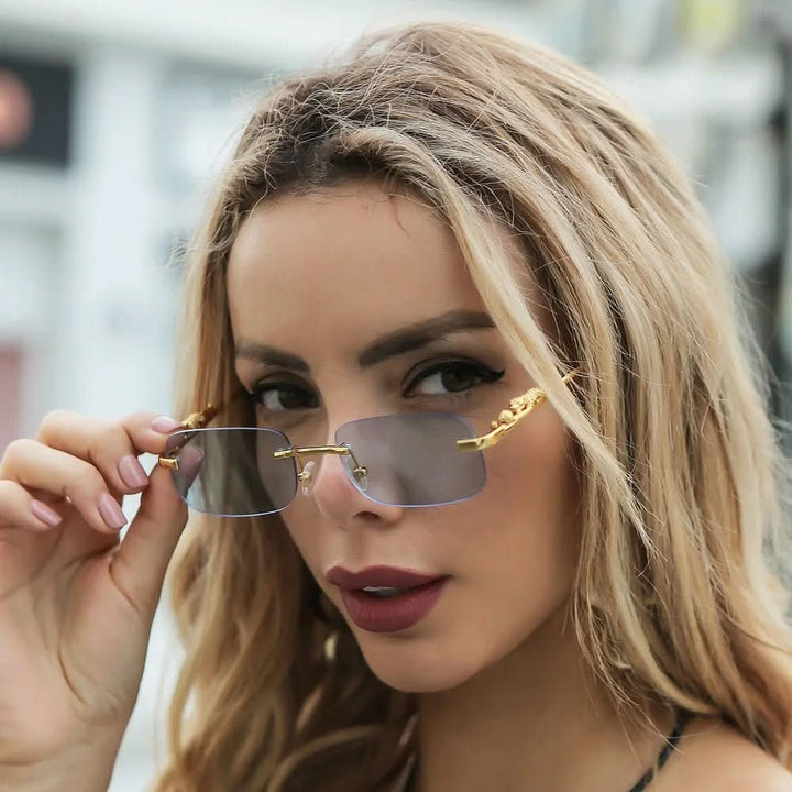 Outdoor-Accessoire: Randlose Sonnenbrille mit Leopardenkopf-Design, unisex, UV400.