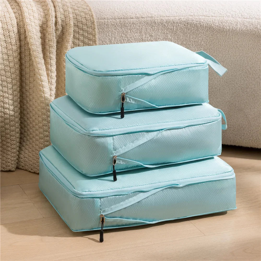 Ordnung im Koffer dank des Unisex Reise-Organizer Sets mit 3 komprimierbaren, wasserdichten Gepäcktaschen.