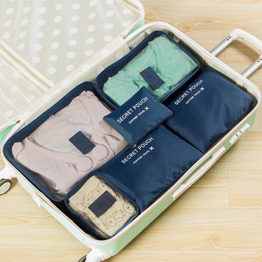 Gepäckorganisation leicht gemacht mit diesem 6-teiligen Reiseaccessoires Set von Packwürfeln & Taschen.