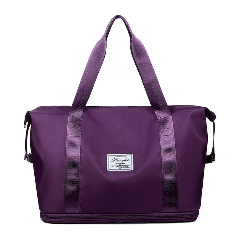 Robuste Unisex Reisetasche aus strapazierfähigem Material. Ein praktischer Reisebegleiter für jede Reise.