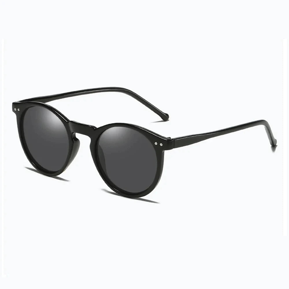 Stilvolle Unisex Retro Sonnenbrille, runde Gläser, UV400 Schutz. Mode-Accessoire für jeden Tag.