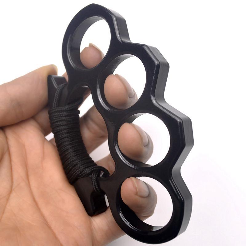Kompakter schwarzer Aluminium-Fingerring zur Selbstverteidigung, diskretes Taschenwerkzeug.