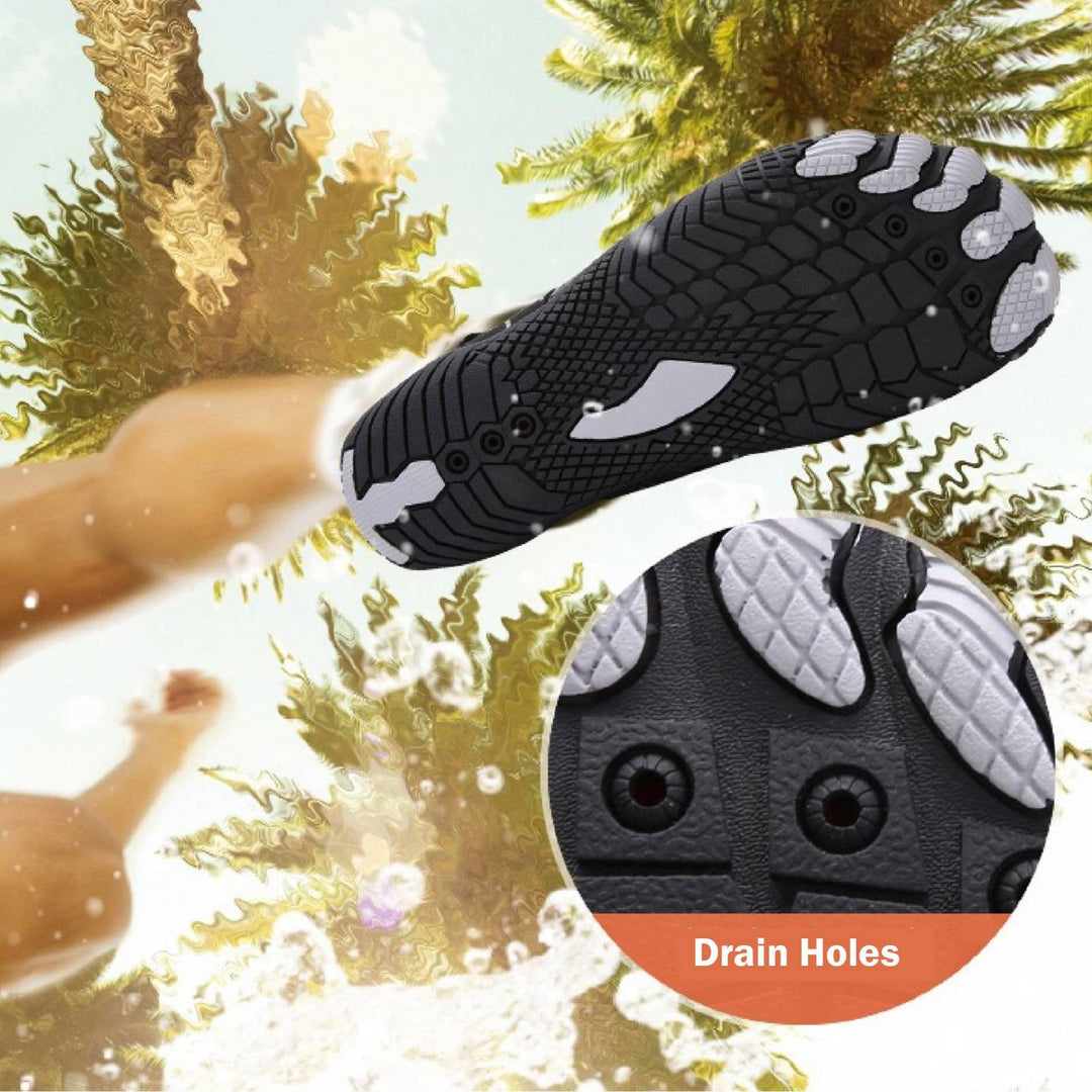 Rutschfeste Profilsohle der Aquaschuhe für Herren & Damen, ideal für sicheren Halt am Strand & Pool.