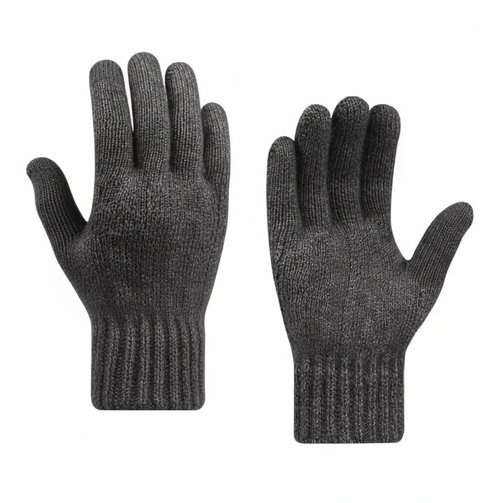 Elegante schwarze Winterhandschuhe mit Touchscreen-Funktion, halten die Hände warm und smart für jedes Smartphone.