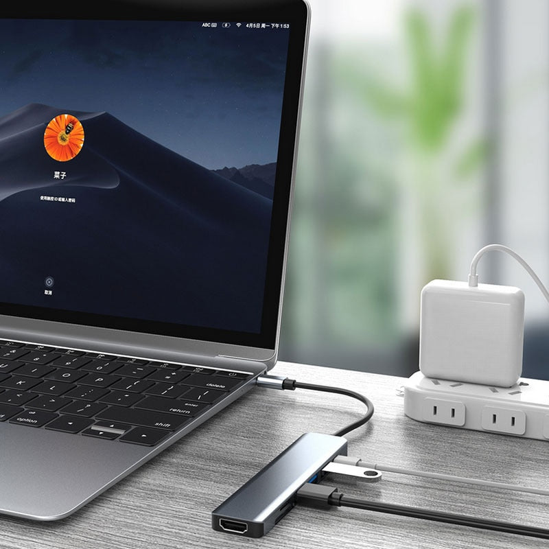 Erweiterungs-Hub: USB-C auf HDMI 4K, SD-Kartenleser, Ethernet & Power Delivery für maximale Konnektivität.