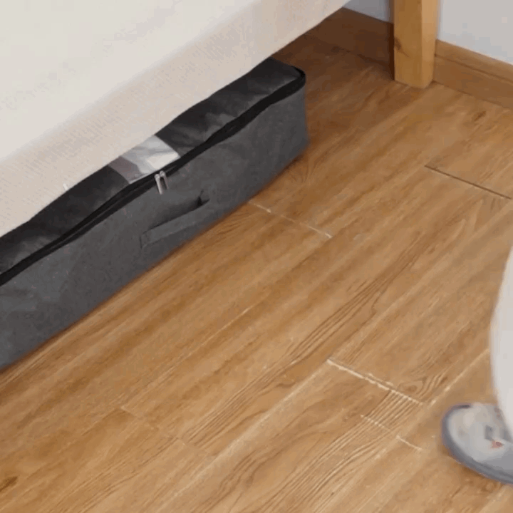 Effiziente Unterbett-Aufbewahrungstasche mit Sichtfenster für platzsparende Organisation von Textilien unterm Bett.