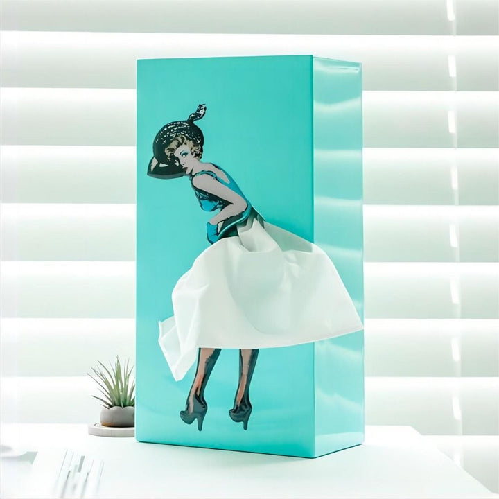 Dekorative Flying Skirt Taschentuchbox mit dynamischem Rock-Design, ideal für eine verspielte Wohnkultur.