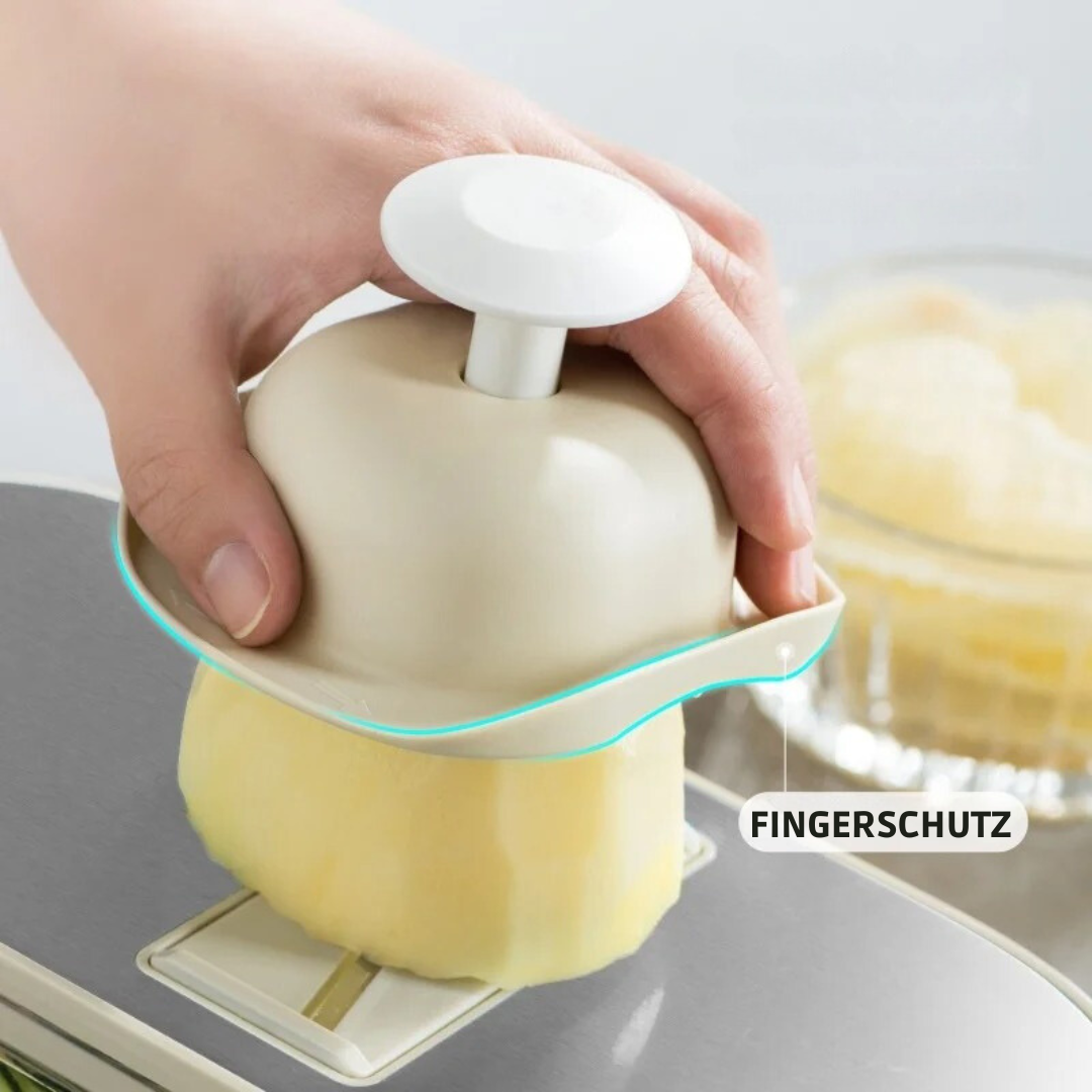 Der 6-in-1 Gemüseschneider mit geschnittenem Gemüse und Salatzutaten. Macht Kochen einfacher und schneller.
