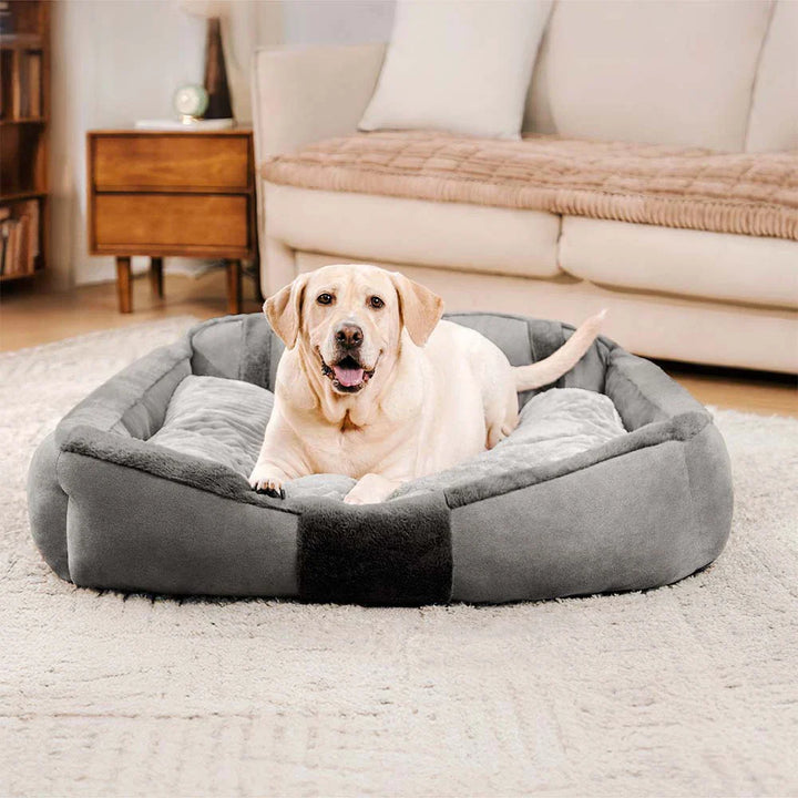Beruhigendes Hundebett mit Gelenkunterstützung, im Vintage Sofa-Stil. Grau, waschbar und super gemütlich.