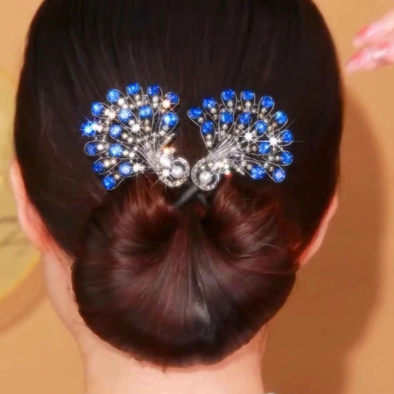 Vintage Pfauen Haarspange für Damen mit eleganten blauen und grünen Federn, ein schönes Haaraccessoire.