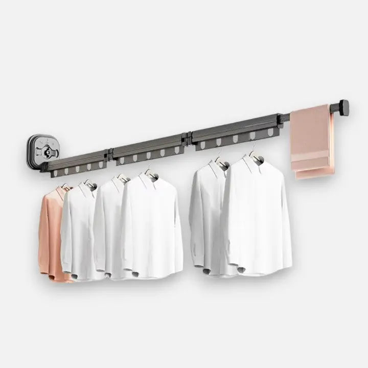 Zusammengeklappter Wand-Wäschetrockner, unauffällig und platzsparend an der Wand, ideal für kleine Räume.