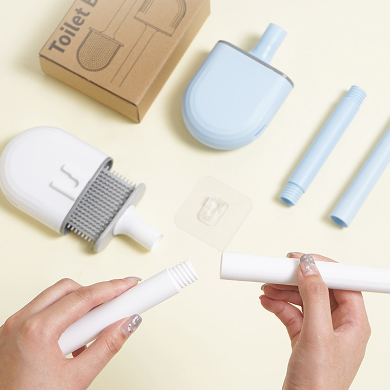 Hygienische WC-Bürste mit flexiblem Silikonkopf für Tiefenreinigung der Toilette, wandmontiert & geruchsdicht.