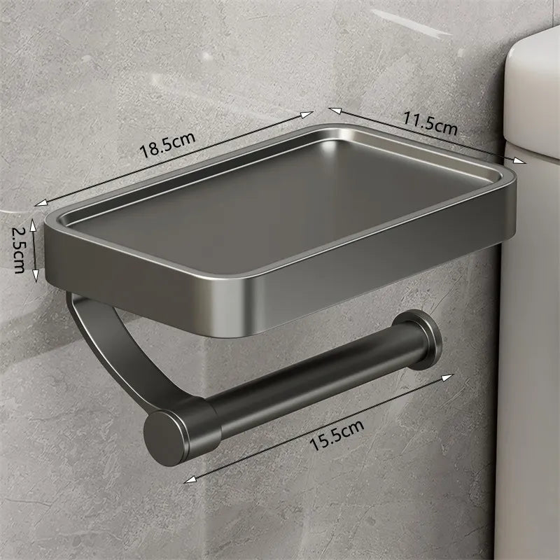 Robuster Toilettenpapierhalter aus Metall mit Ablage, ideal für eine aufgeräumte Badumgebung.