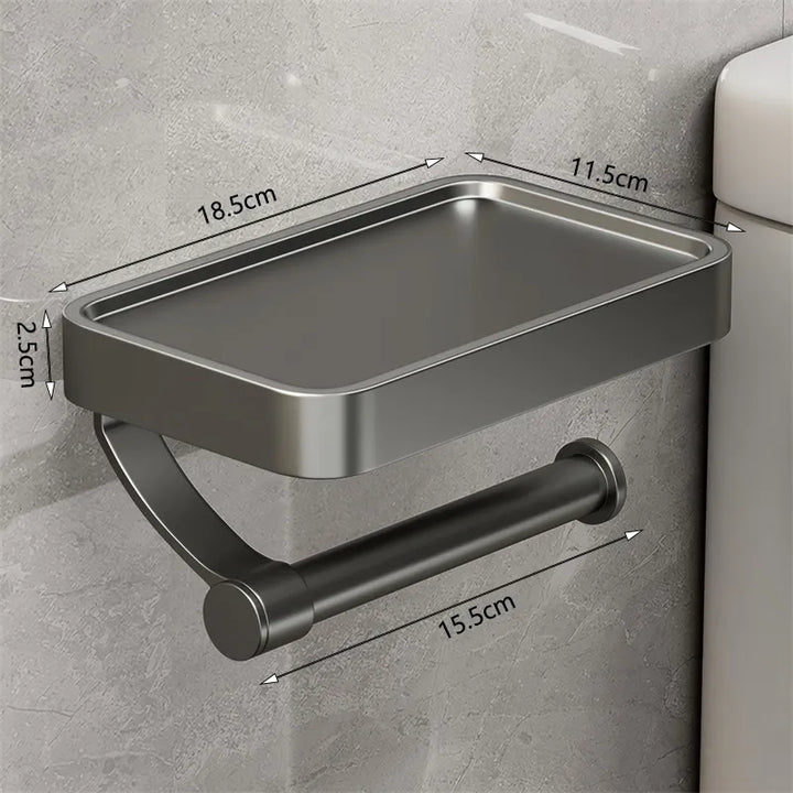 Robuster Toilettenpapierhalter aus Metall mit Ablage, ideal für eine aufgeräumte Badumgebung.