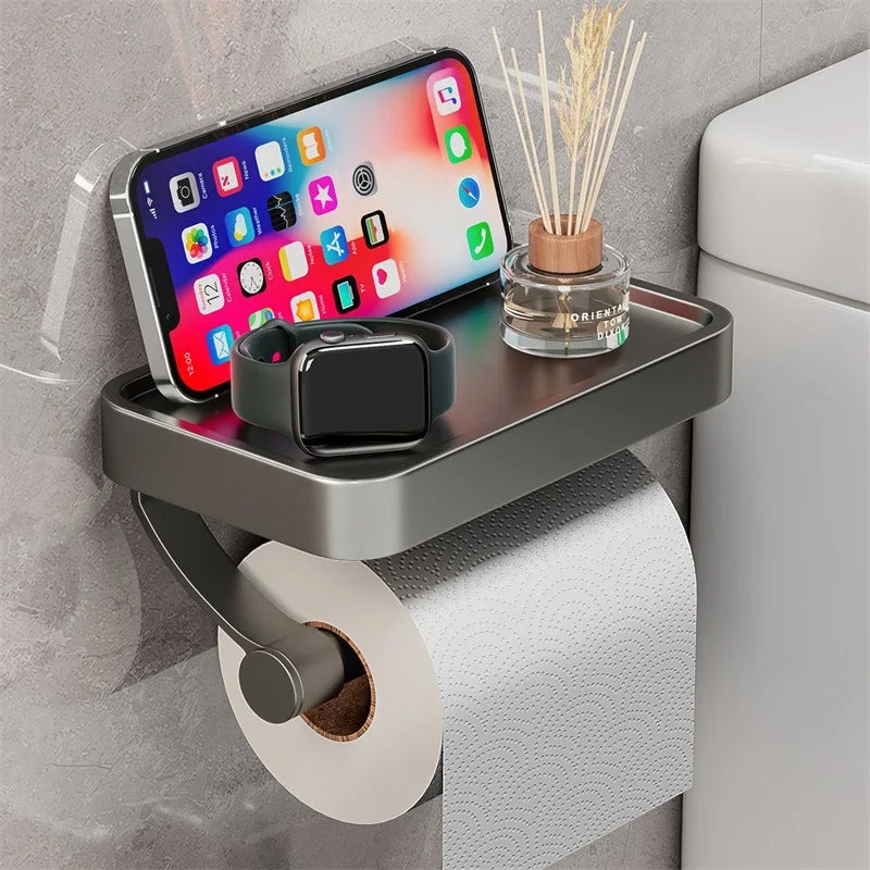 Praktischer WC-Rollenhalter mit Ablage für Badaccessoires, wandmontiertes Design.