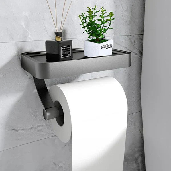 Eleganter Toilettenpapierhalter für Bäder, wandmontiert und mit nützlicher Ablagefläche.