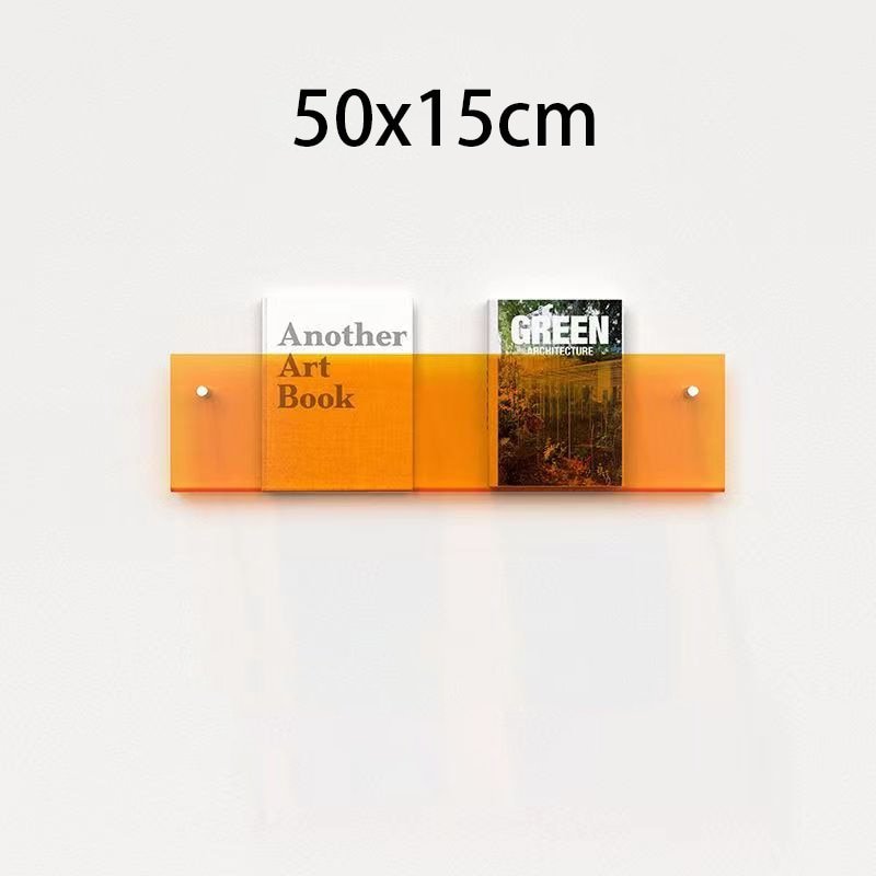Acryl-Halter für Magazine mit schwebender Optik, ideal für die moderne Wohnzimmergestaltung.