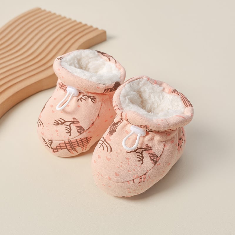 Kuschelige Baby Winter-Booties aus weichem Material, halten kleine Füße bei Kälte warm & trocken.