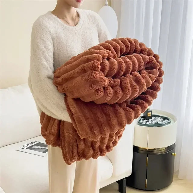 Wintertaugliche Plüschdecke. Besonders warm und weich für gemütliche Stunden auf dem Sofa.