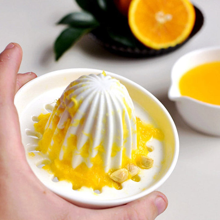 Gesunde Keramik-Saftpresse, ideal für frische Vitamine und den täglichen Saftgenuss.