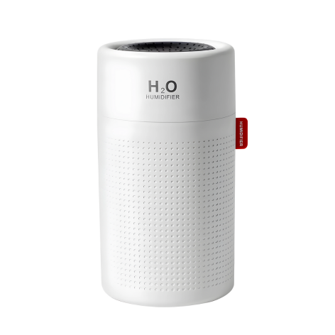 Stilvoller weißer AirWave Luftbefeuchter neben Bett, schafft optimales Raumklima zum Entspannen.