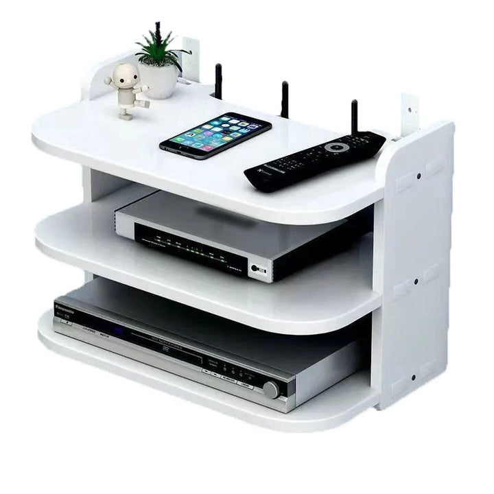 Modernes schwebendes Regal zur eleganten Kabelorganisation für Router und Mediengeräte im Wohnzimmer.