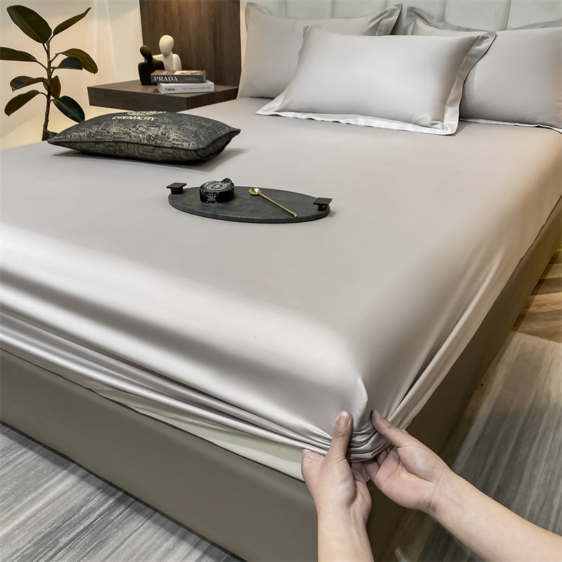 Pflegeleichtes, atmungsaktives Spannbettlaken aus Baumwolle, perfekt passend für jedes Schlafzimmer.