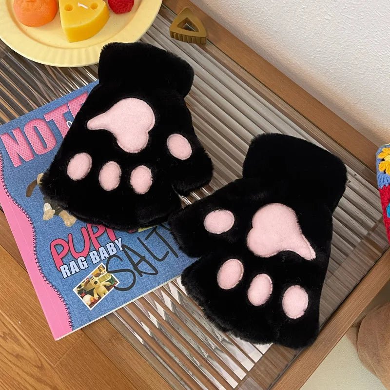 Kuschelige Damen-Fäustlinge für warme Hände. Genießen Sie den Winter mit diesen stylischen Katzenpfoten-Handschuhen.