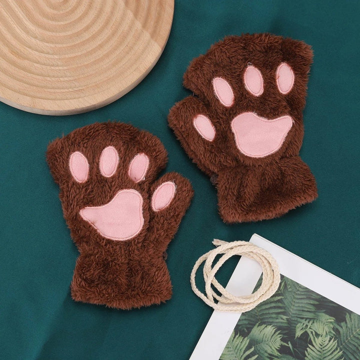 Damen-Winterfäustlinge mit Katzenpfoten-Design. Perfekt für Outdoor-Aktivitäten an kalten, verschneiten Tagen.