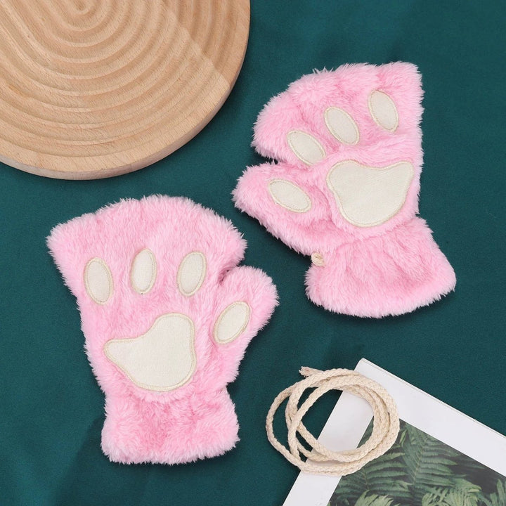 Warme, weiche Damen-Fäustlinge mit Katzenpfoten-Motiv. Stylisches und funktionales Winteraccessoire.
