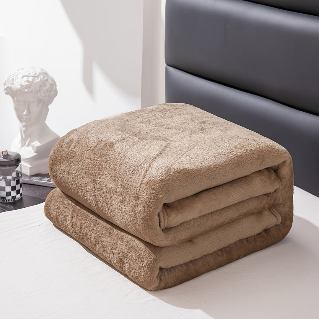 Ganzjährige Flanelldecke, weich und warm, ideal für gemütliche Abende im Wohnzimmer.