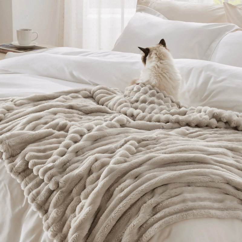Weiche, warme Kuscheldecke aus Fleece für gemütliche Abende zuhause.
