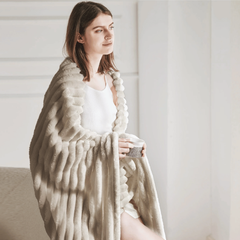 Warme Fleece-Kuscheldecke, perfekt für gemütliche Stunden und tiefe Entspannung.