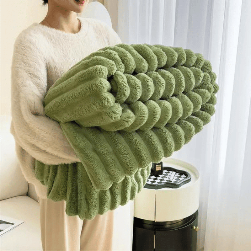 Bequeme Fleecedecke, weich und warm, ideal für entspannte Stunden zuhause.