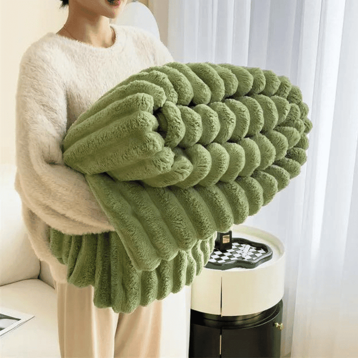 Bequeme Fleecedecke, weich und warm, ideal für entspannte Stunden zuhause.