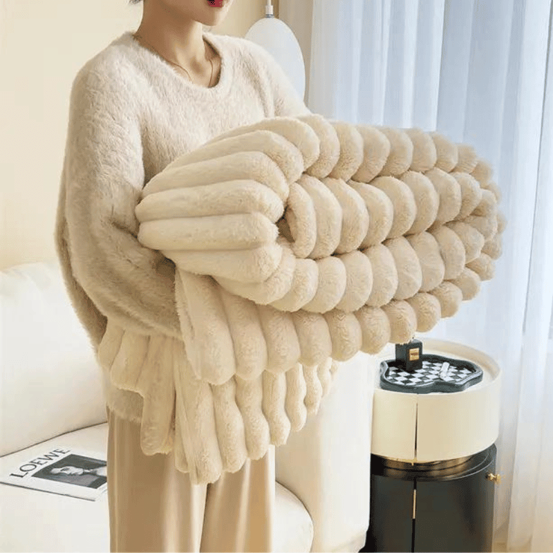 Gemütliche Decke für Sofa und Bett, flauschig und wärmend.