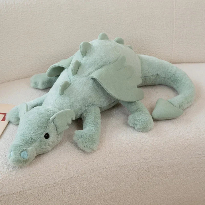 Weiches Drachen-Plüschtier, ein zauberhaftes Fabelwesen, das als Spielzeug und Kuscheltier dient.