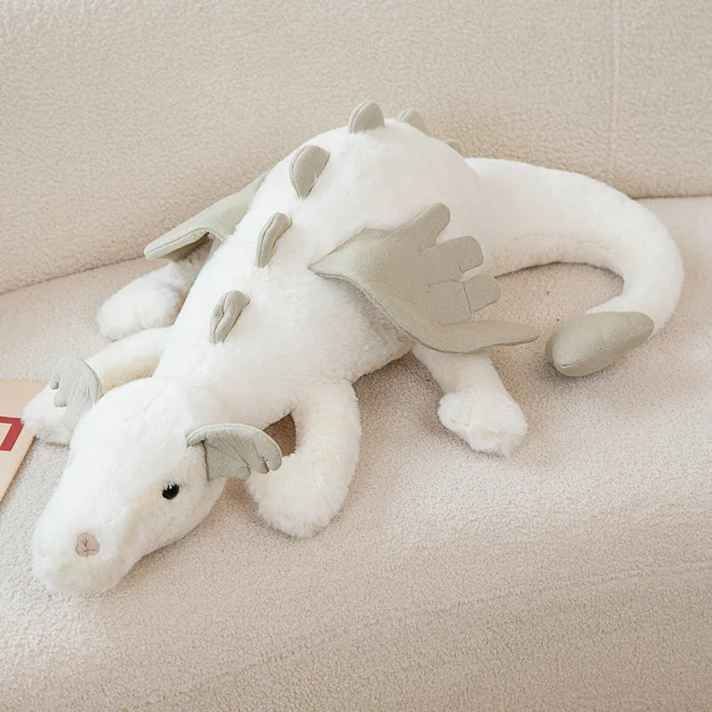 Farbenfroher, kuscheliger Drache als Plüschtier, das ideale Spielzeug für magische Kinderfantasien.