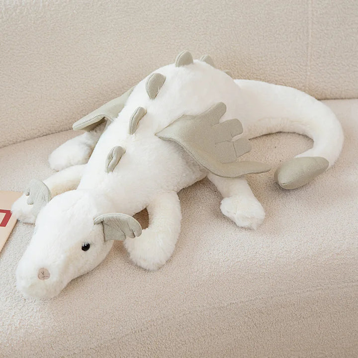 Farbenfroher, kuscheliger Drache als Plüschtier, das ideale Spielzeug für magische Kinderfantasien.