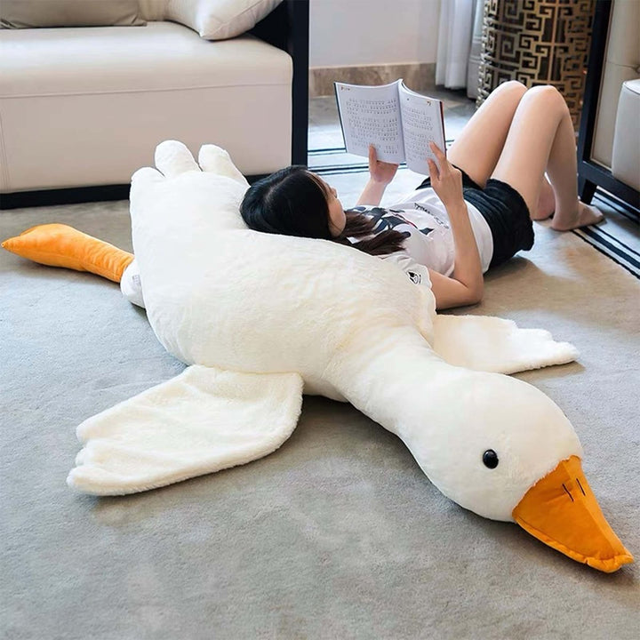 Weiches Gänse Plüschtier, ideal als Kuscheltier und Kissen für Kinder, fördert traumhaften Schlaf.