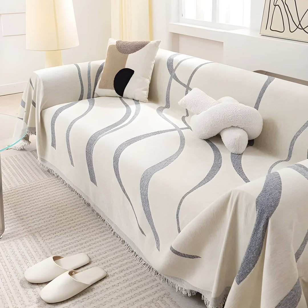 Wendbarer Sofaüberwurf aus Chenille-Baumwolle in Grau/Khaki. Stilvoller Schutz für Wohnzimmersofas, haustierfreundlich & waschbar.