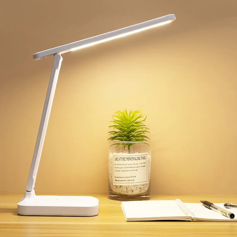Moderne USB-LED-Lampe, wiederaufladbar und dimmbar, mit praktischer Mobilgerätehalterung. Augenschonend.